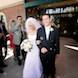 jefferson city missouri wedding photographer: after cermemony couple rains bubbles